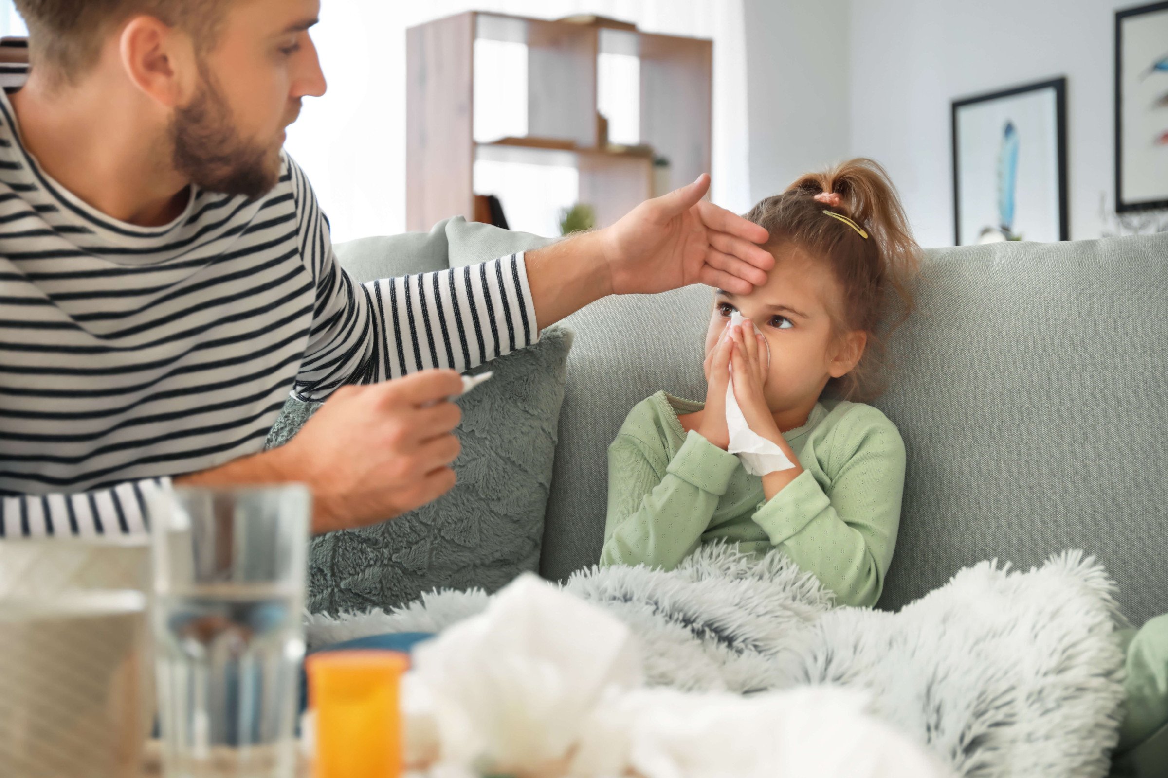 Sick Child comforted by father